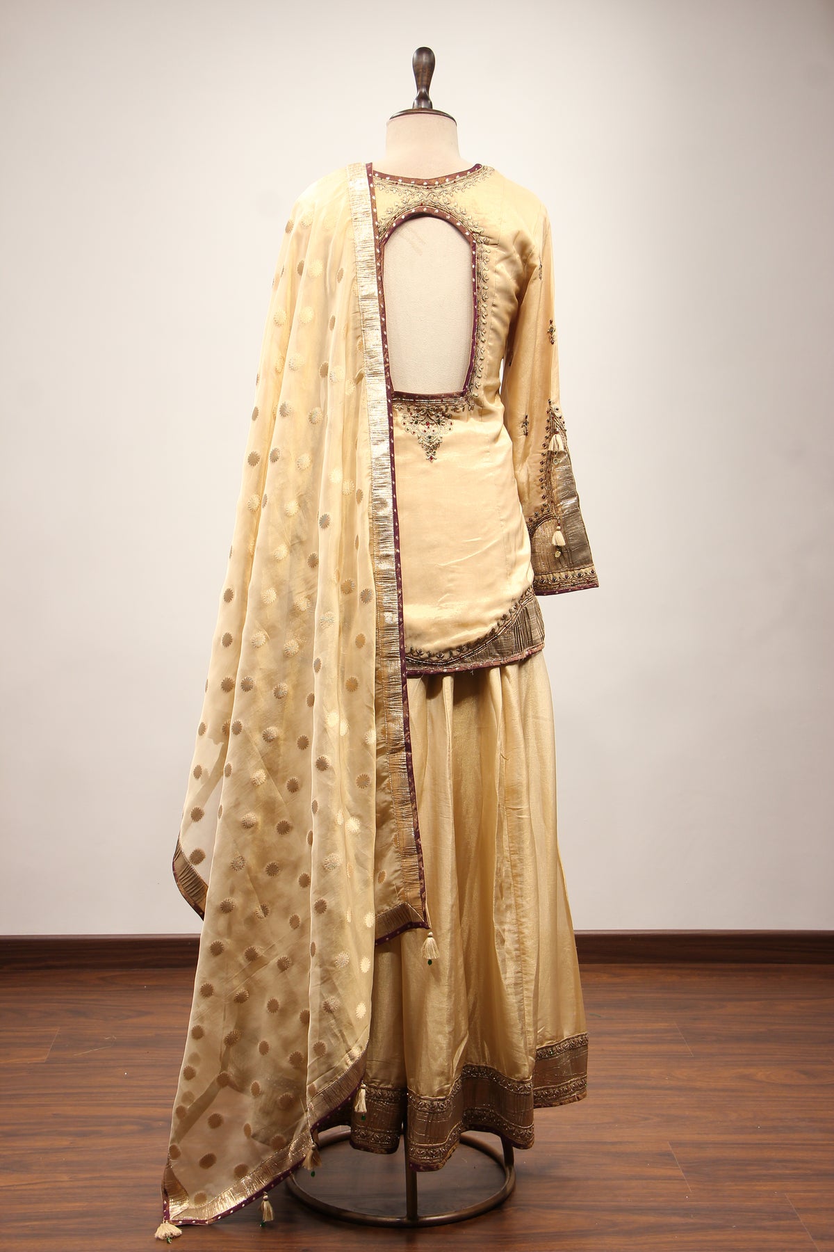 Tissue Sharara Suit with Gota Patti & Zari Handwork Brocade Dupatta in Gold – back view