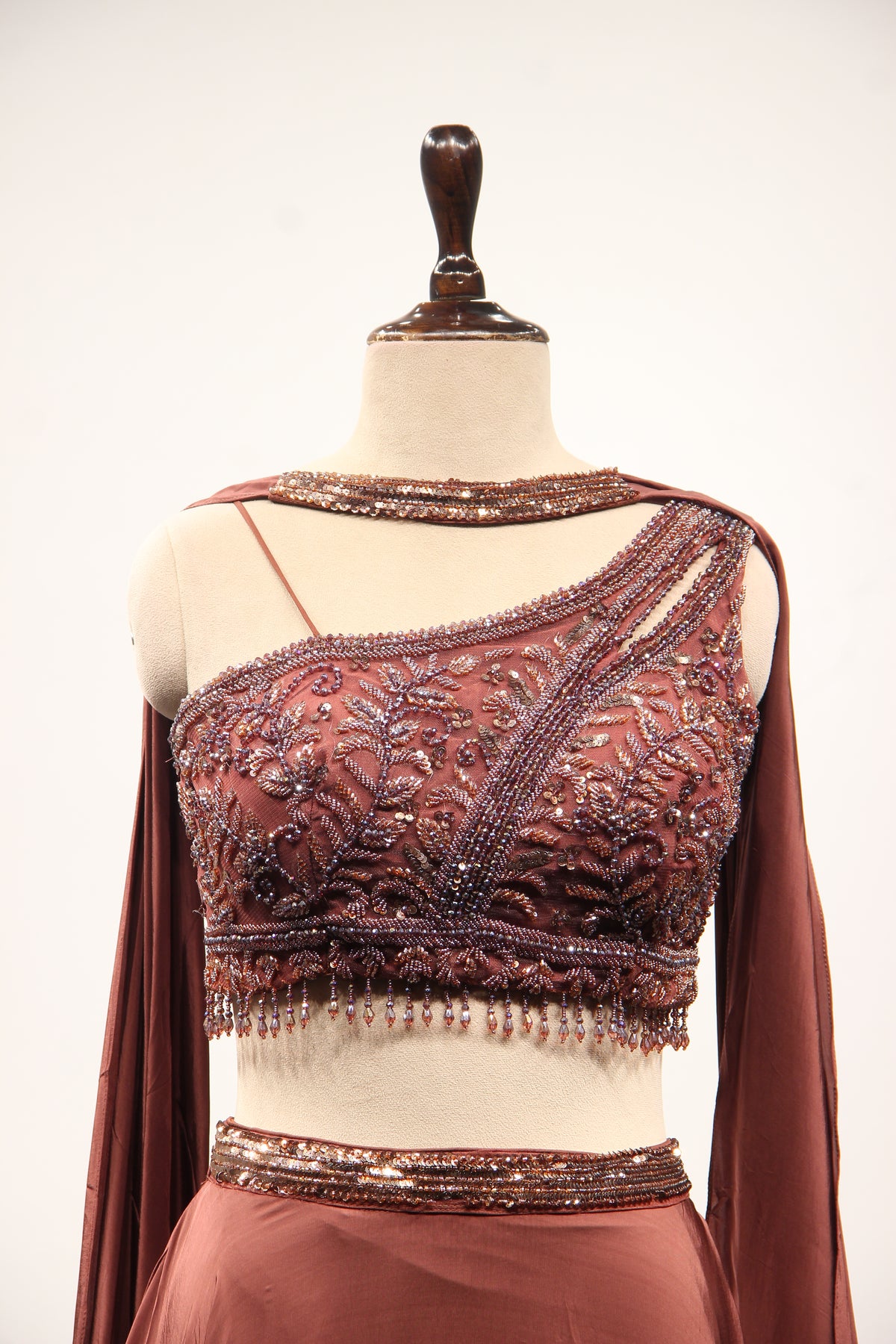 Brown Crepe Off Shoulder Lehenga with Cut Dana & Bead Handwork Top – front close-up
