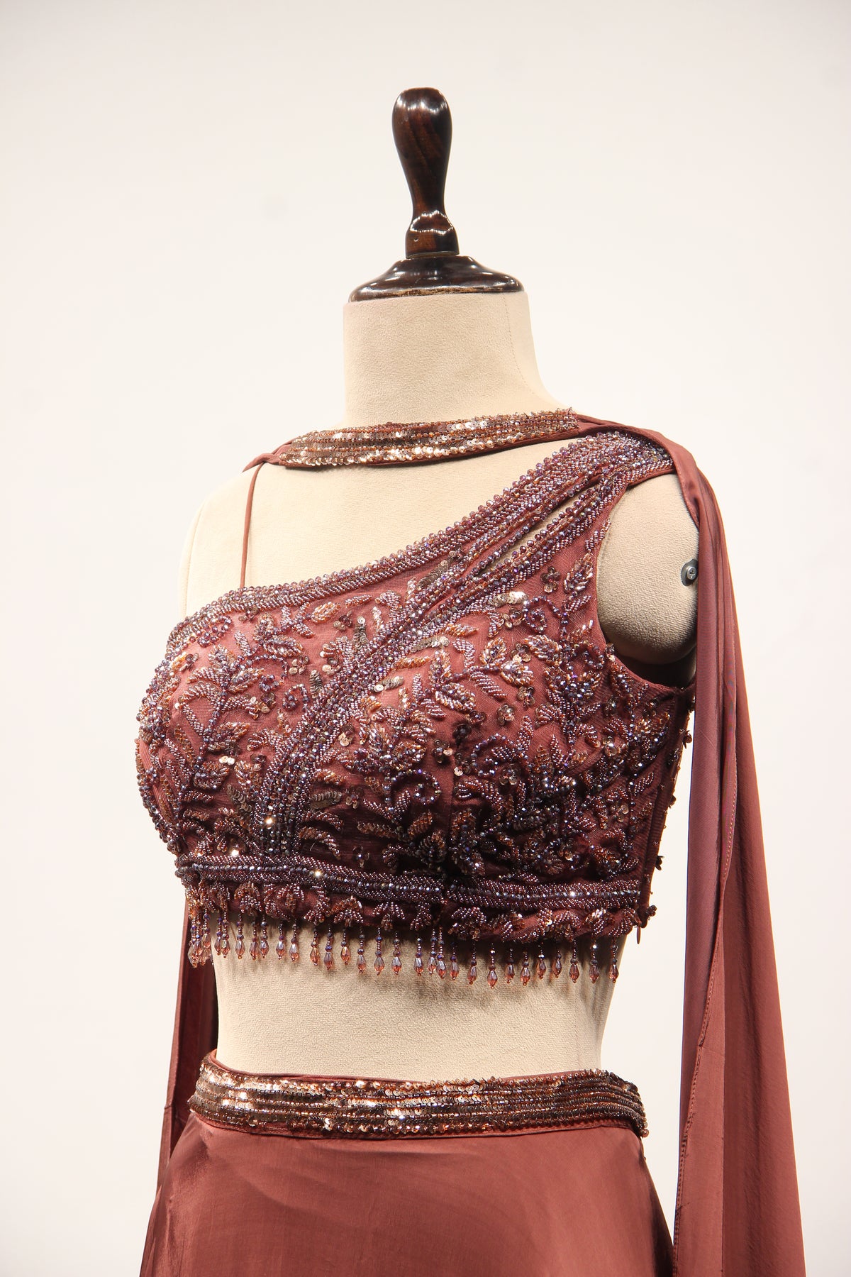 Brown Crepe Off Shoulder Lehenga with Cut Dana & Bead Handwork Top – side close-up