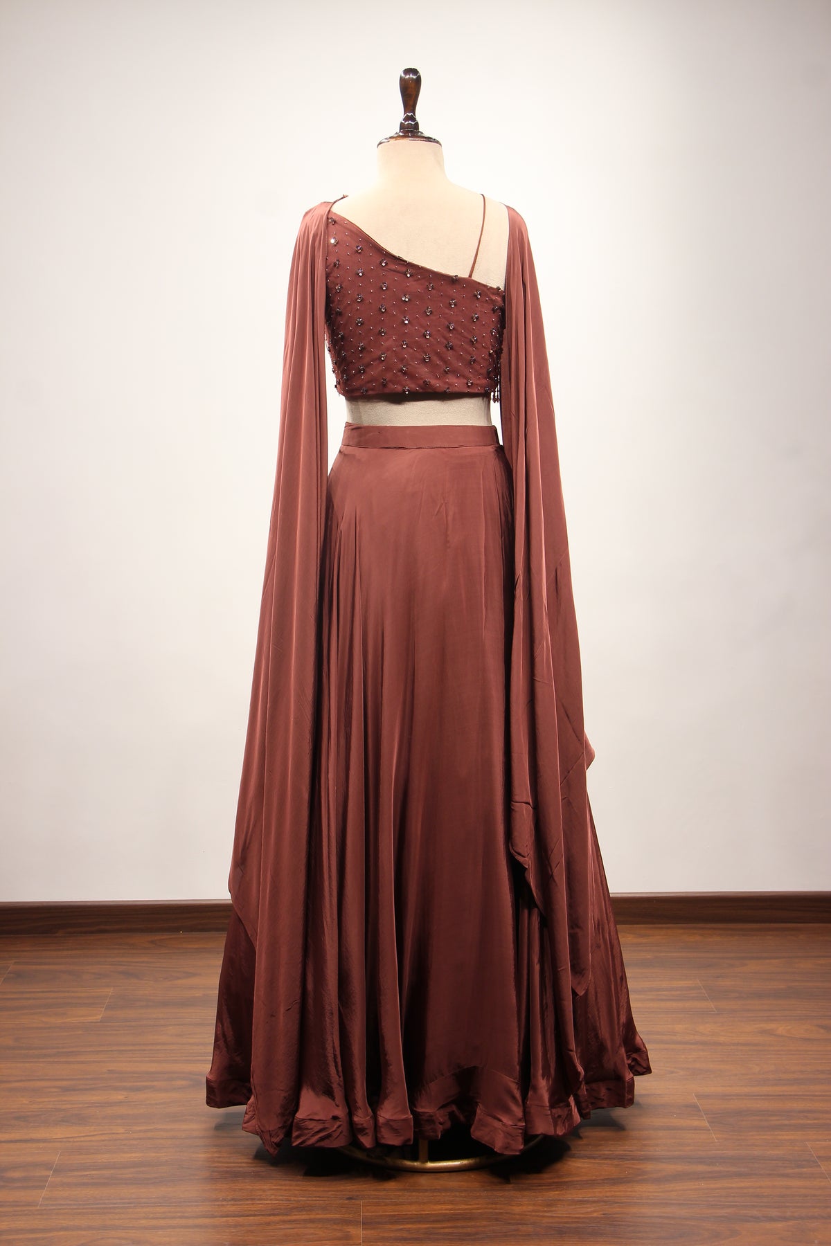 Brown Crepe Off Shoulder Lehenga with Cut Dana & Bead Handwork Top – back view