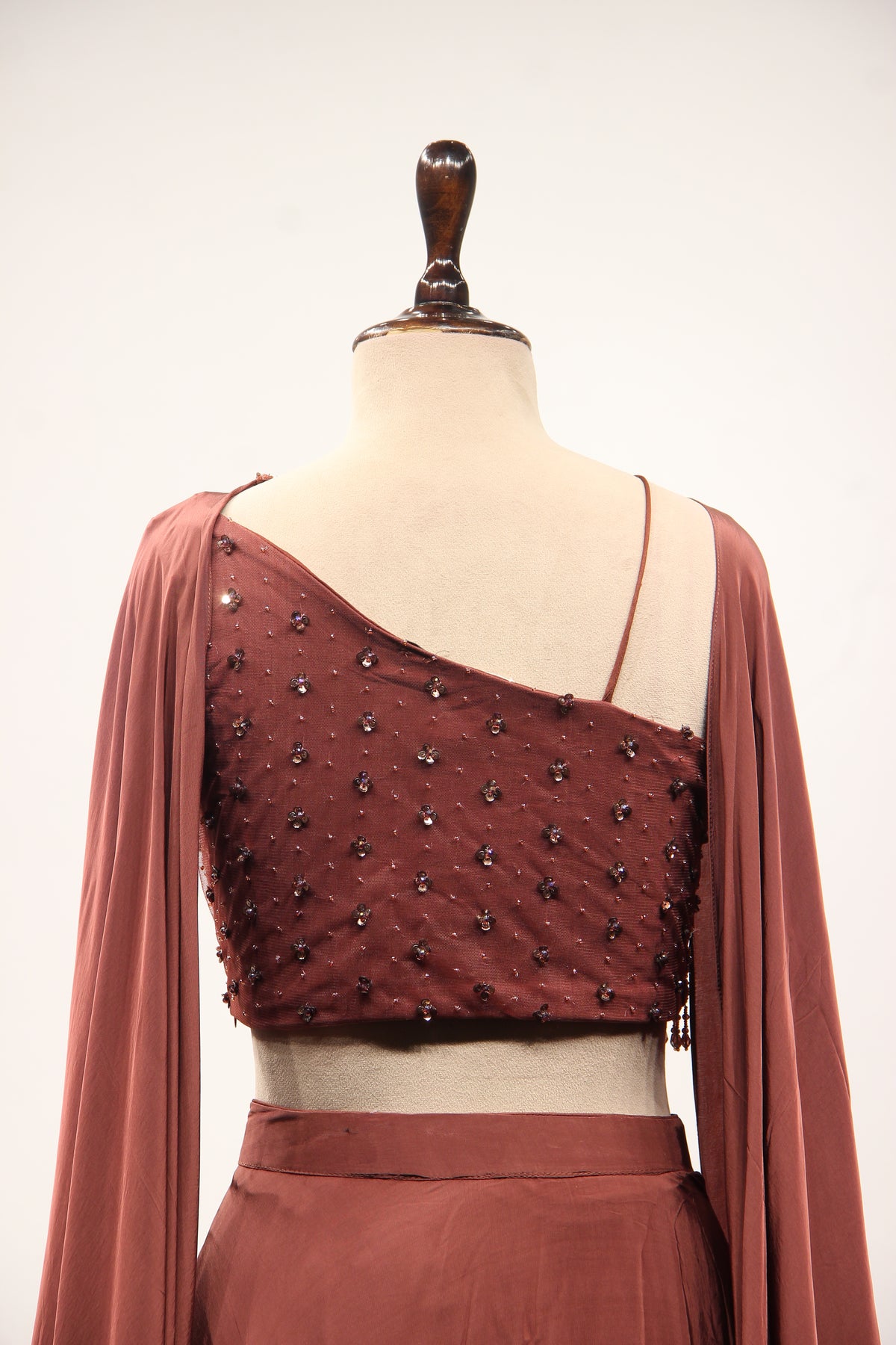 Brown Crepe Off Shoulder Lehenga with Cut Dana & Bead Handwork Top – back close-up