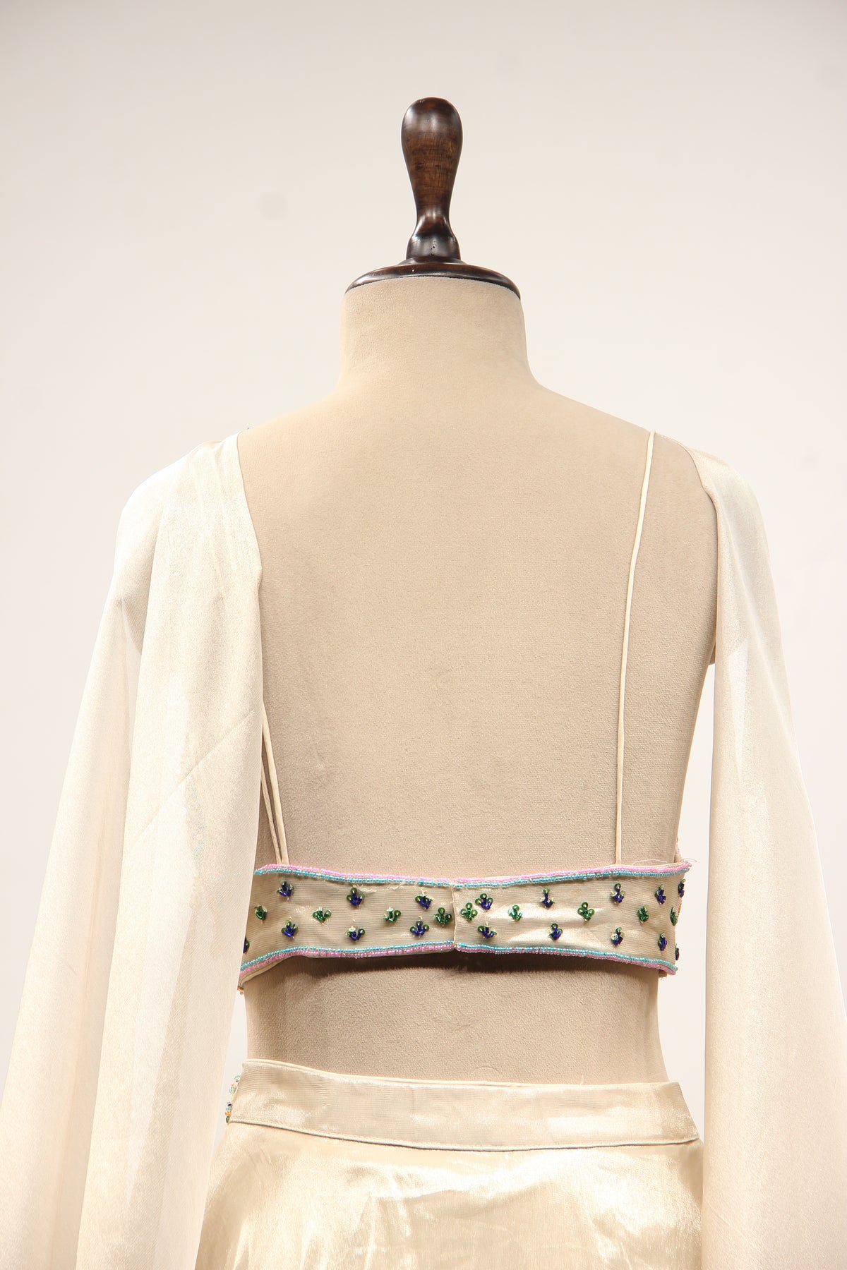 Ivory Shimmer Tissue Lehenga with Sequin & Cut Dana Handwork Crop Top – back close-up
