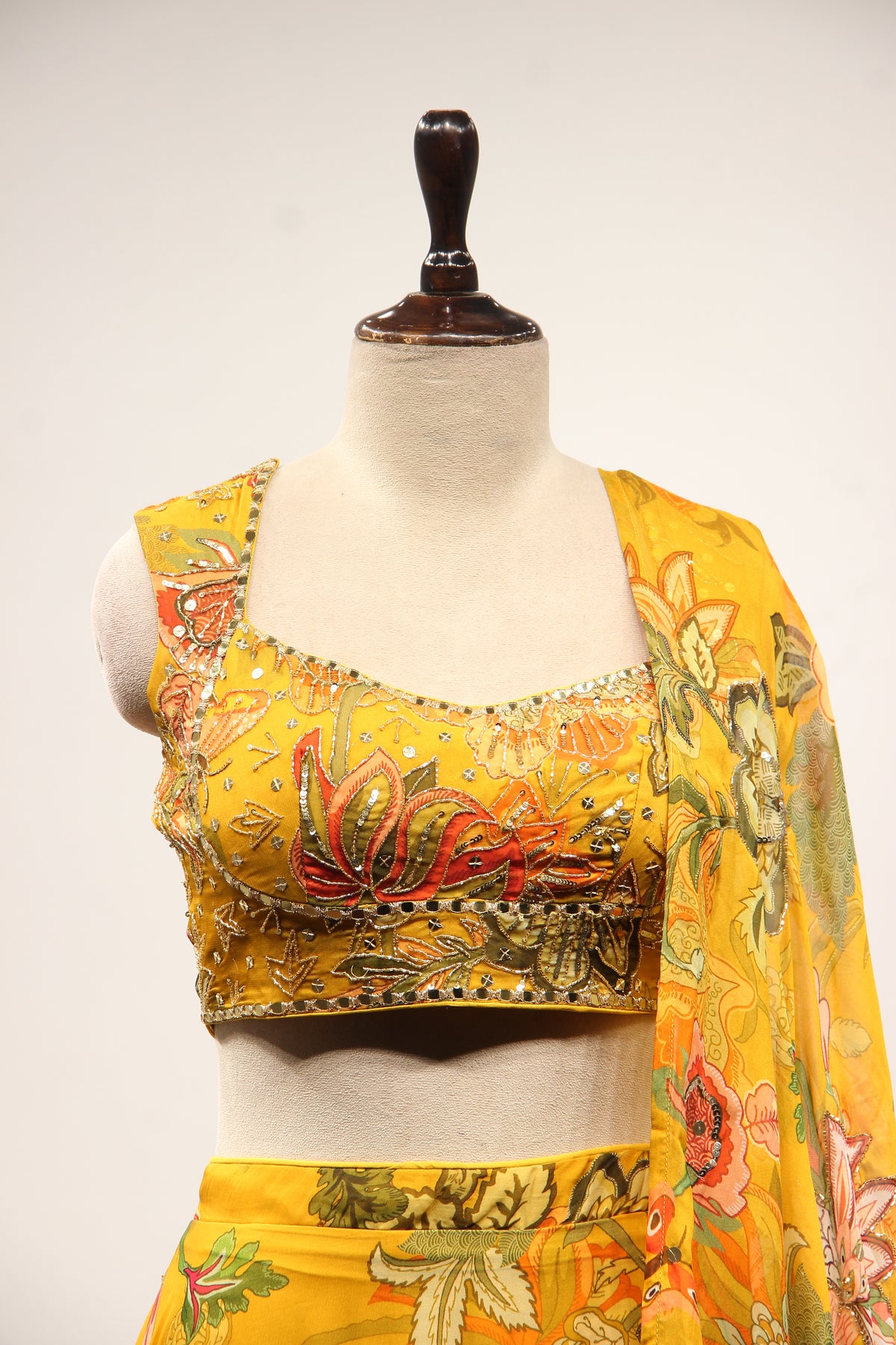 Mustard Floral Organza Lehenga with Printed & Mirror Handwork Crop Top – front close-up