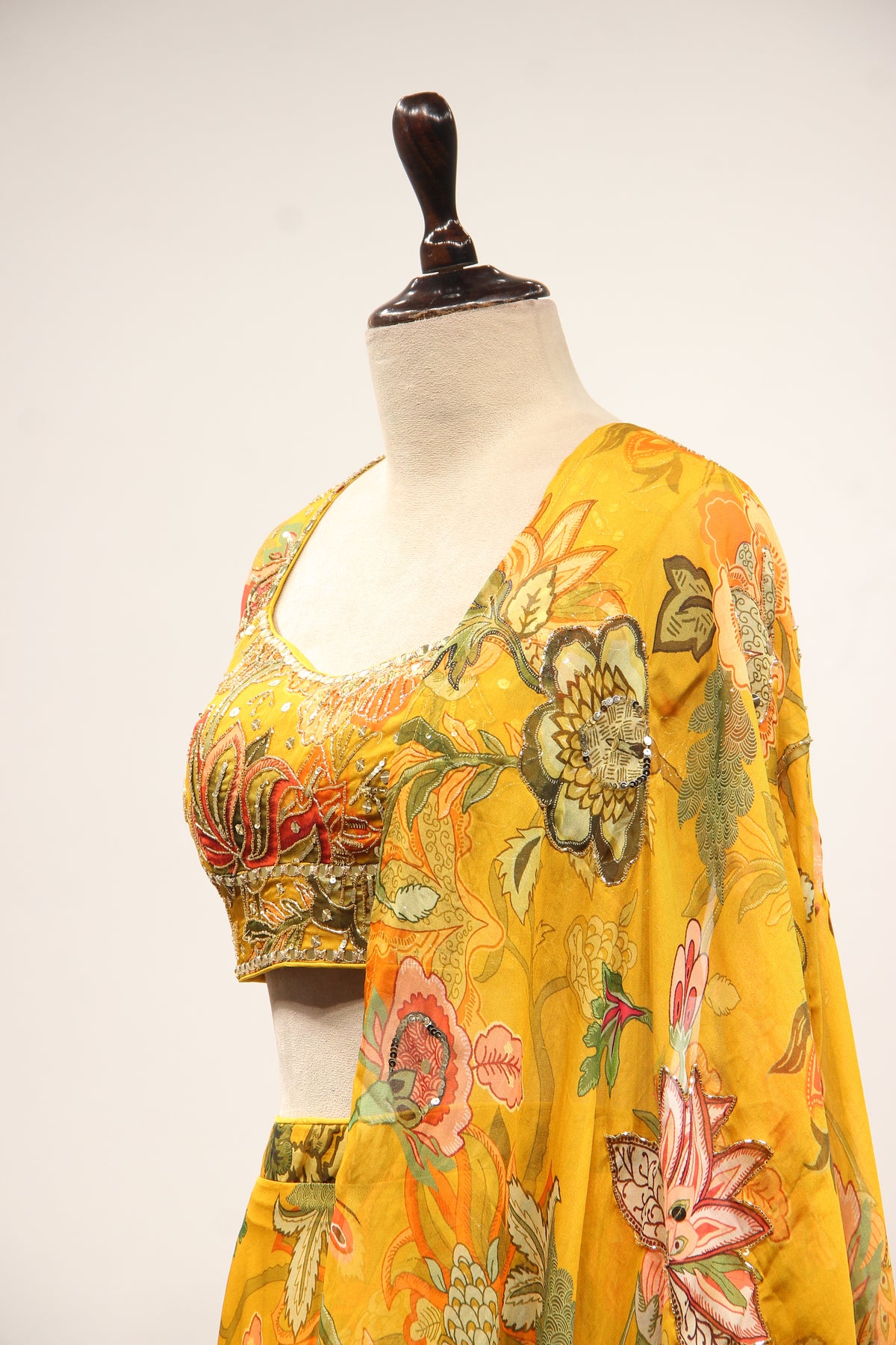 Mustard Floral Organza Lehenga with Printed & Mirror Handwork Crop Top – side close-up