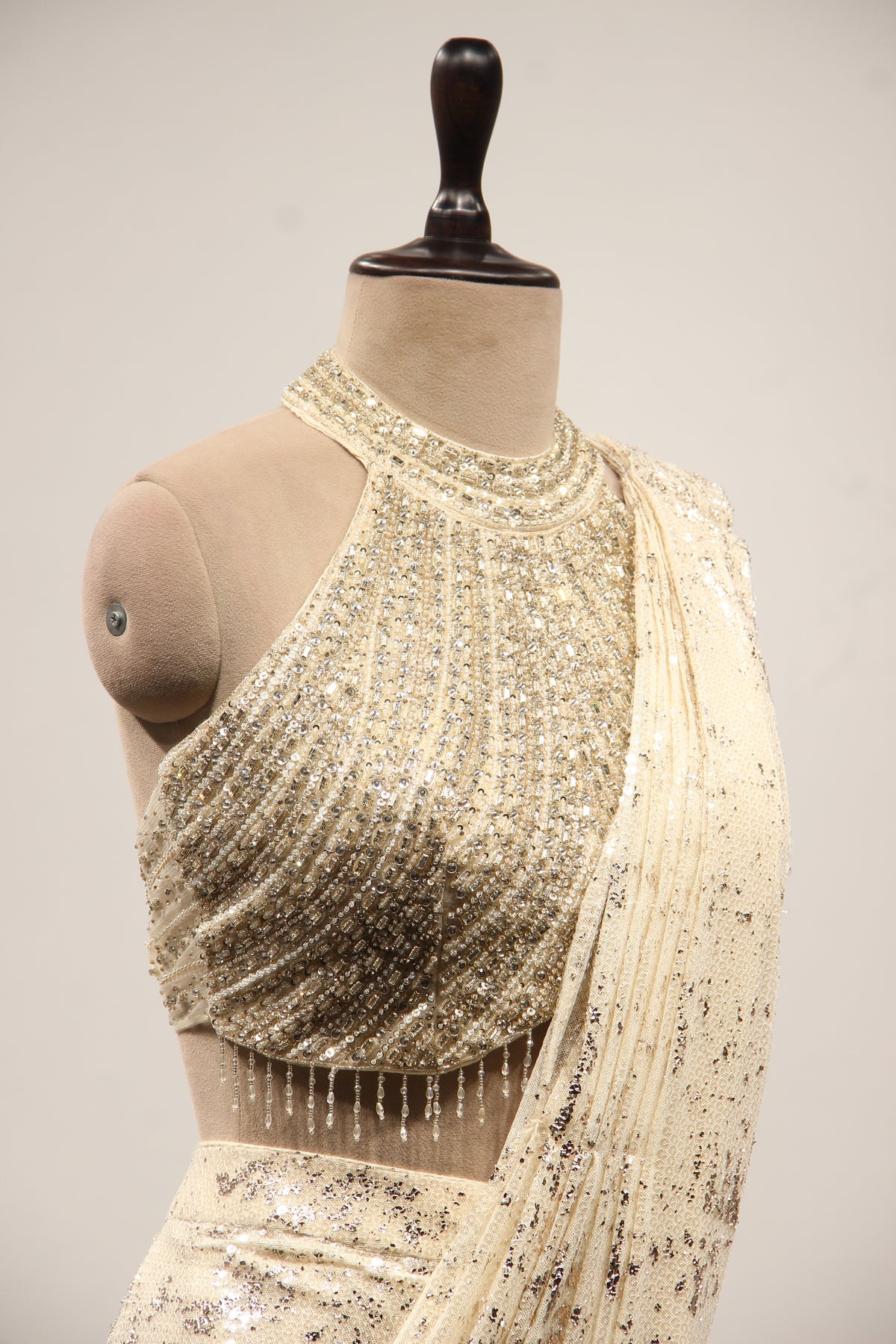Imported Halter Neck Drape Saree with Mirror & Sequin Handwork in Cream – other side close-up
