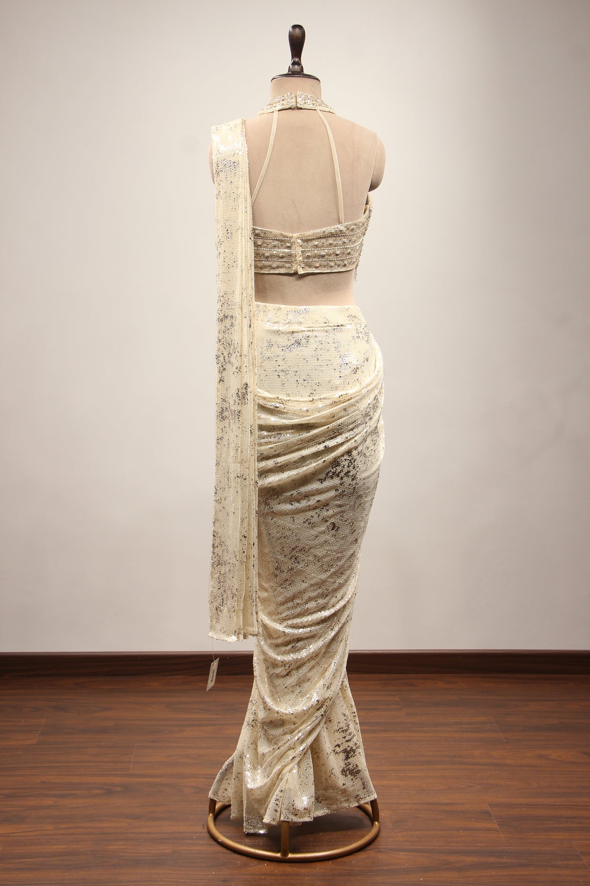 Imported Halter Neck Drape Saree with Mirror & Sequin Handwork in Cream – back view