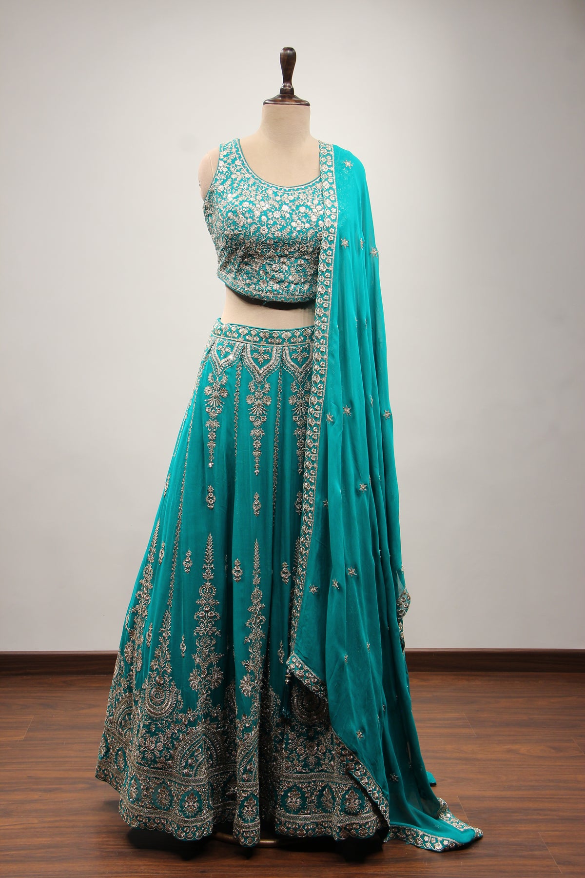 Rama Green Georgette Lehenga with Zari & Sequin Handwork Crop Top – front view