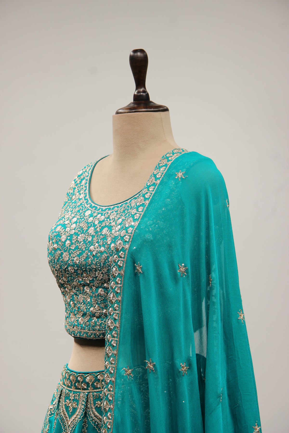 Rama Green Georgette Lehenga with Zari & Sequin Handwork Crop Top – side close-up