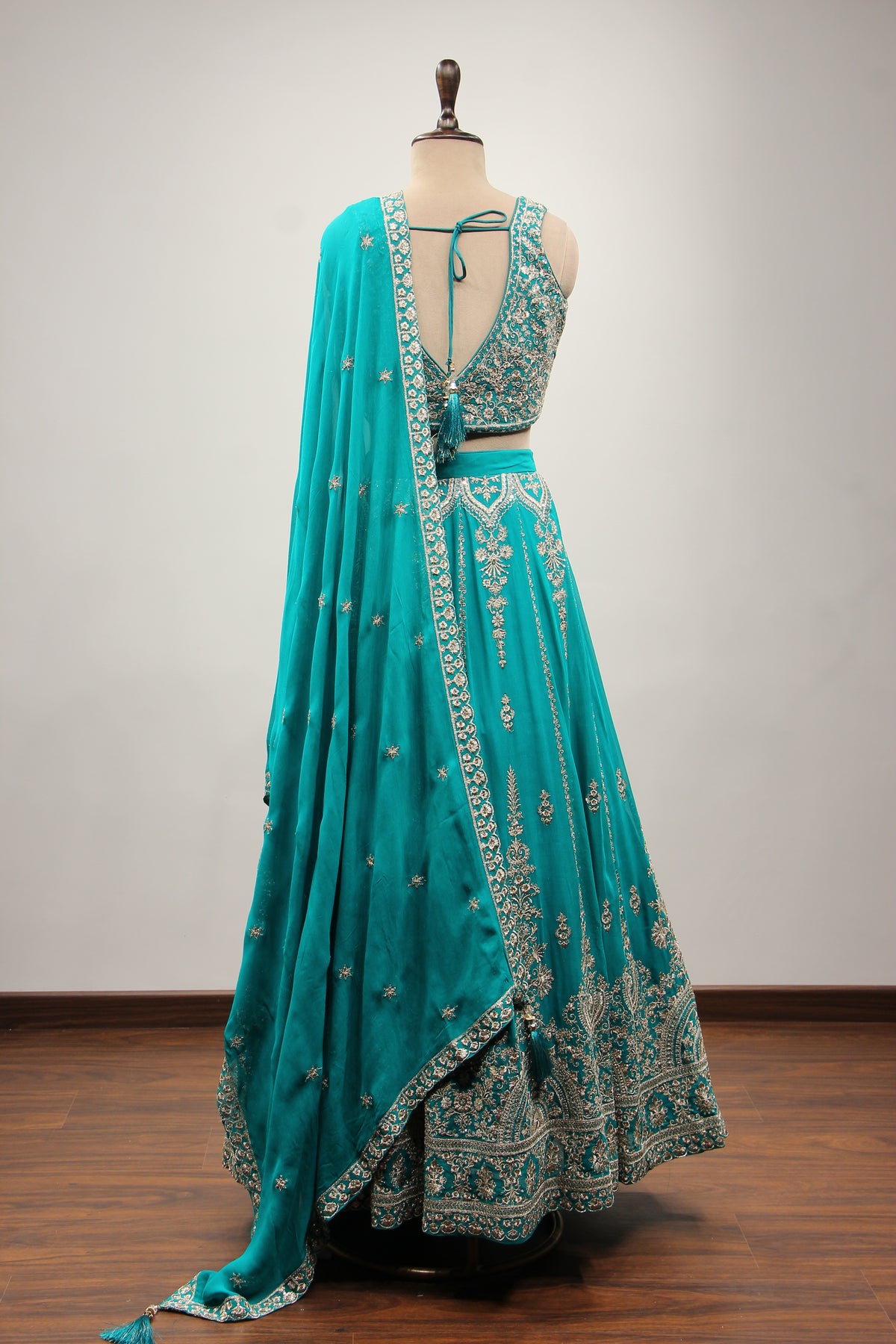 Rama Green Georgette Lehenga with Zari & Sequin Handwork Crop Top – back view