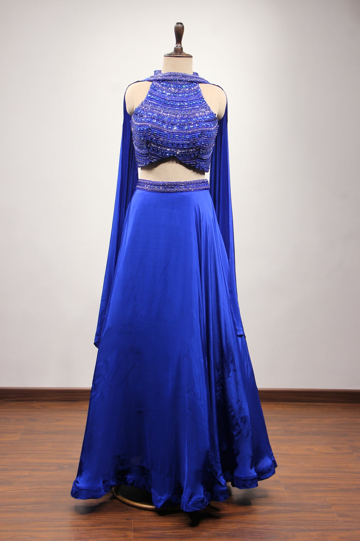 Electric Blue Crepe Halter Lehenga with Stone & Cut Dana Handwork – front view