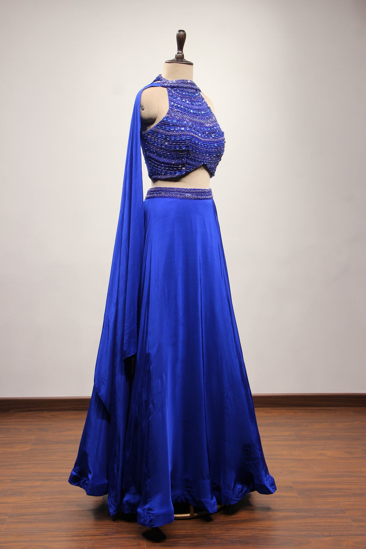 Electric Blue Crepe Halter Lehenga with Stone & Cut Dana Handwork – other side view