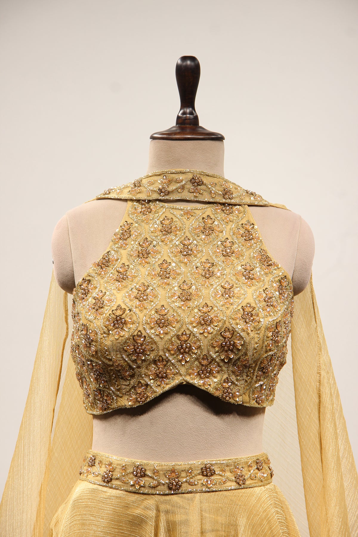 Gold Shimmer Tissue Halter Neck Lehenga with Cut Dana & Bead Handwork – front close-up