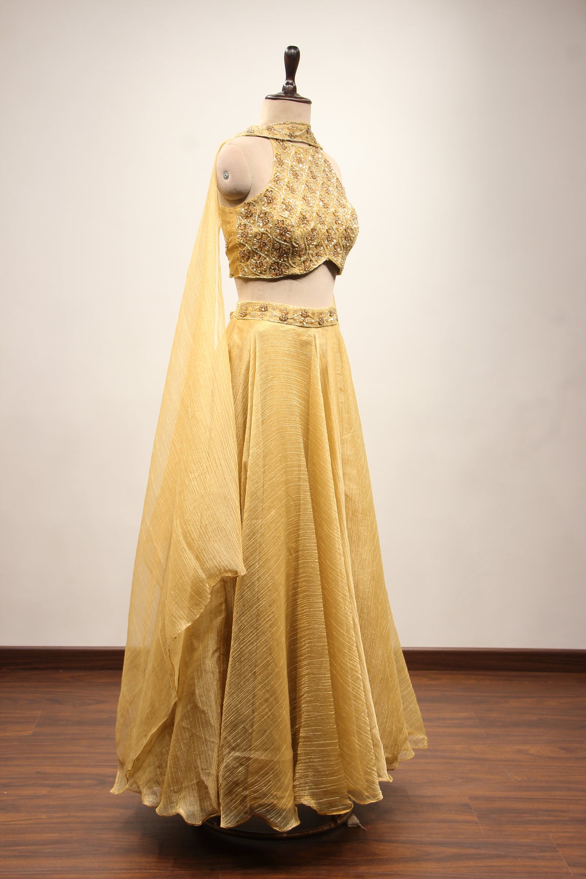 Gold Shimmer Tissue Halter Neck Lehenga with Cut Dana & Bead Handwork – other side view