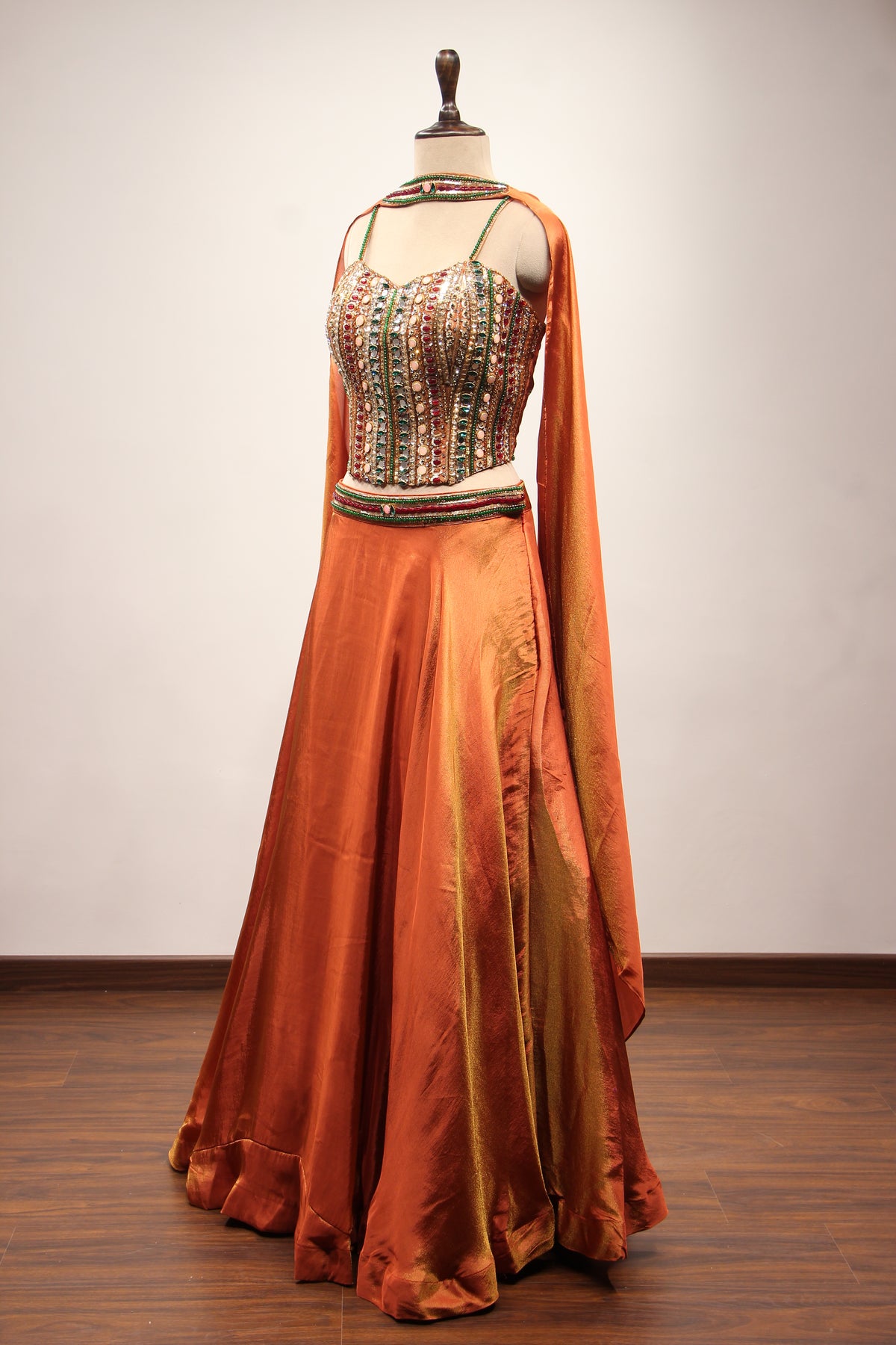 Rust Shimmer Tissue Corset Lehenga in Hand Embroidery & Stone Handwork – side view