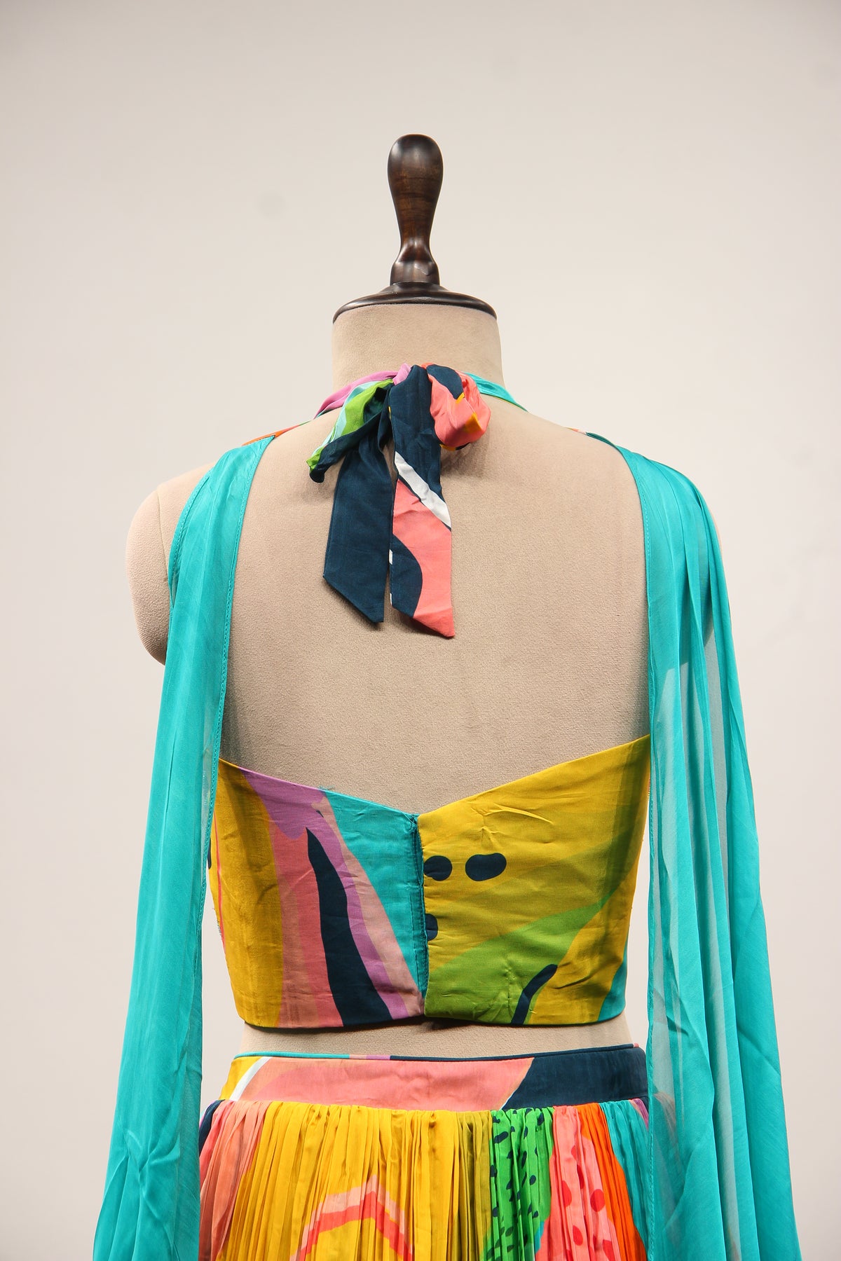Multicolor Printed Crepe Halter Lehenga with Sequin & Bead Handwork – back close-up