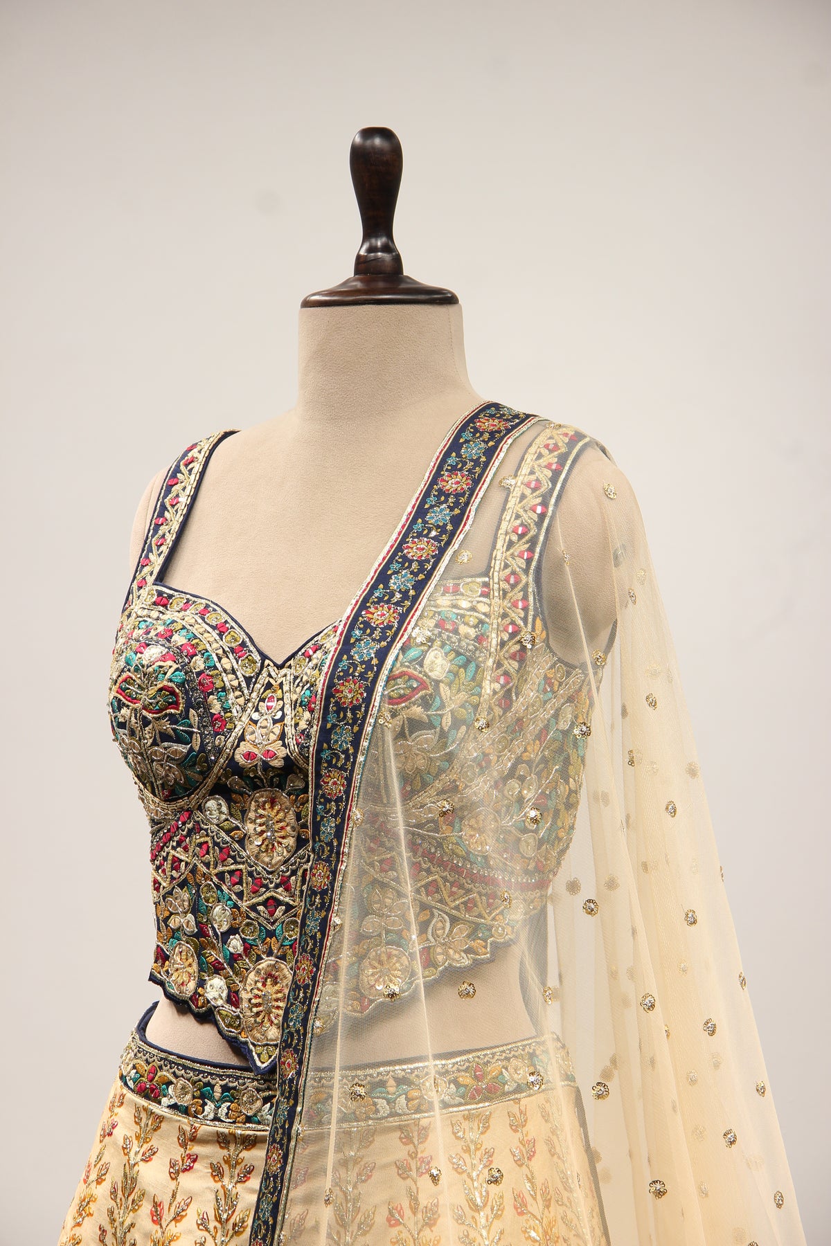 Ivory Ombre Dupion Corset Lehenga with Printed & Gota Patti Handwork – side close-up