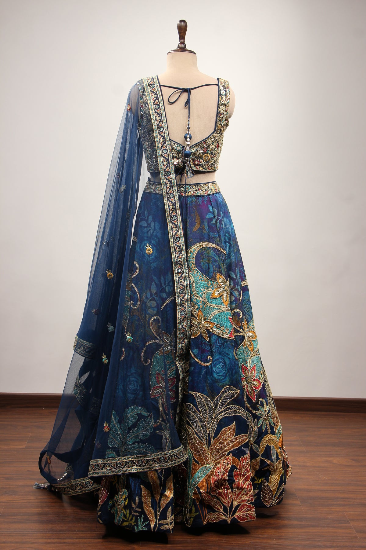 Blue Dupion Printed Lehenga with Gota Patti & Mirror Handwork Crop Top – back view