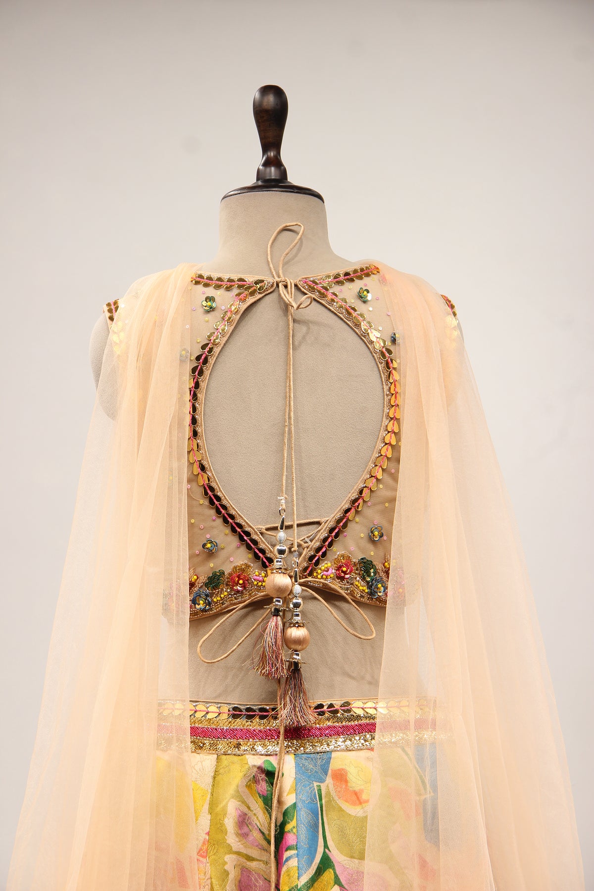 Multicolor Printed Tissue Lehenga with Cut Dana & Sequin Handwork Top – back close-up