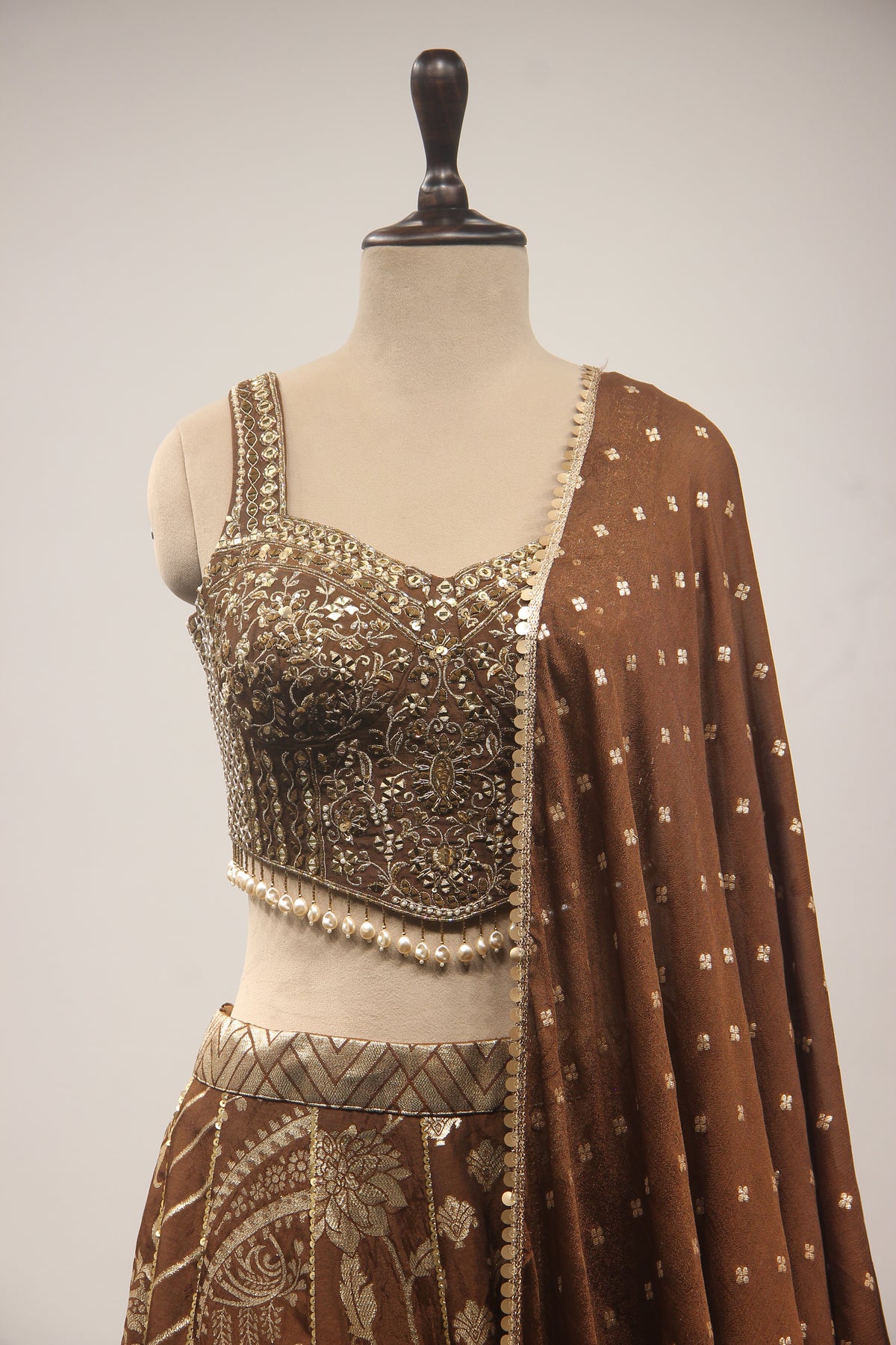 Brown Banarasi Brocade Corset Lehenga with Hand Embroidery & Mirror Handwork