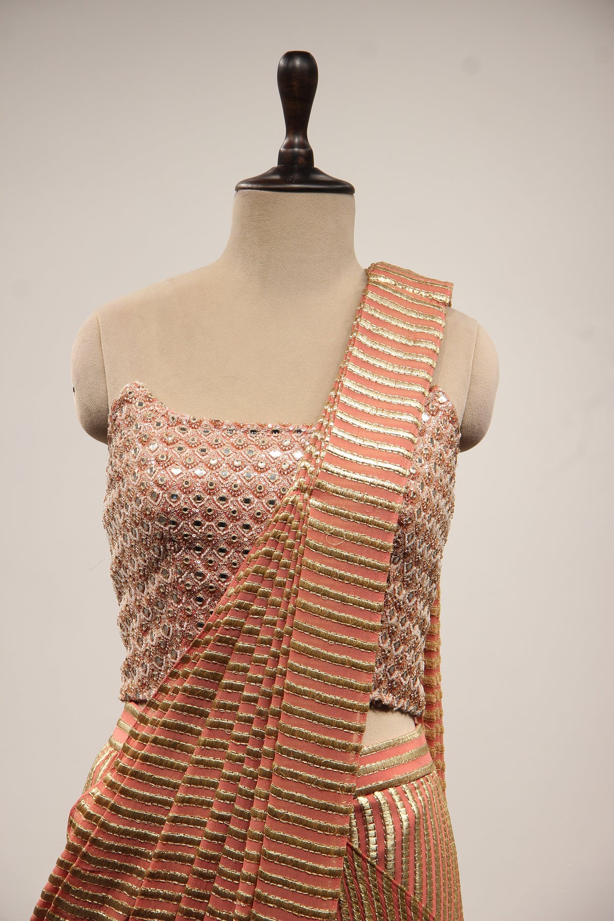 Georgette Drape Saree with Mirror & Pearl Handwork Corset Blouse in Peach