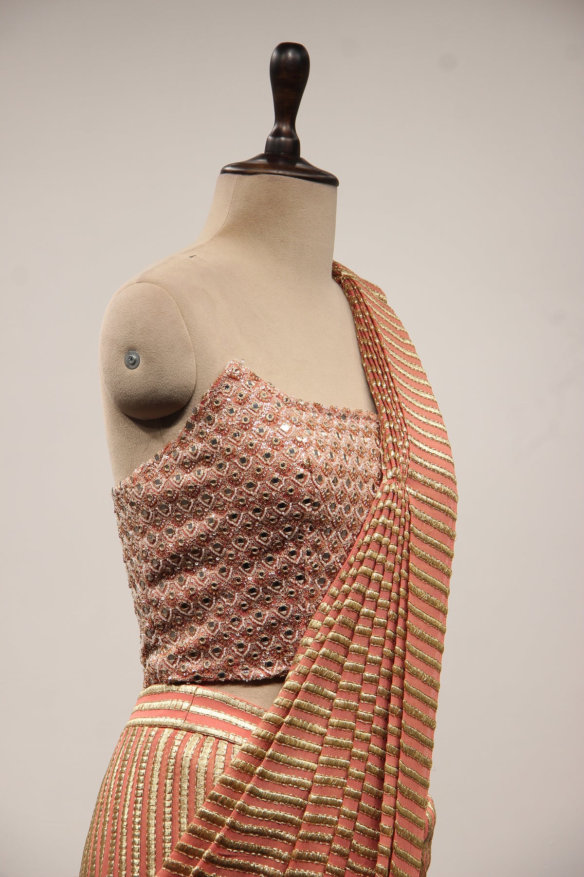 Georgette Drape Saree with Mirror & Pearl Handwork Corset Blouse in Peach
