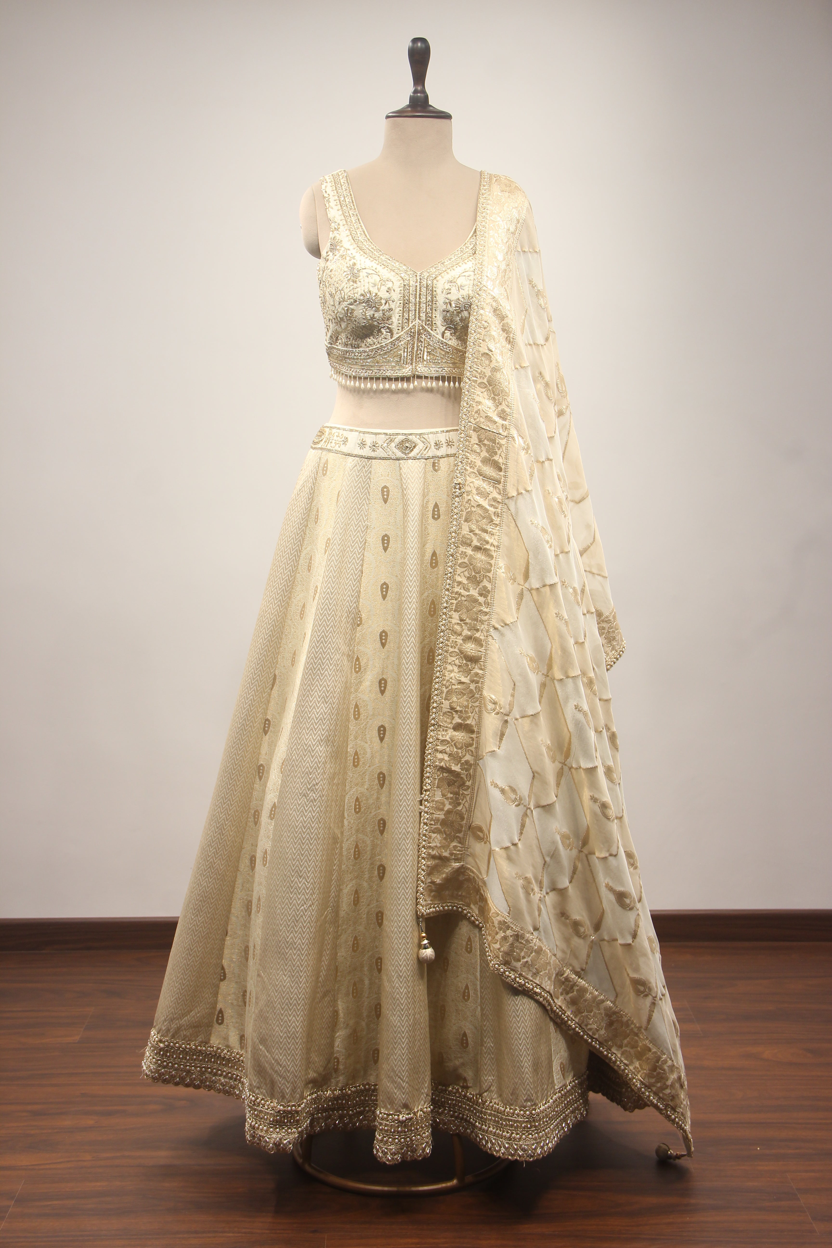 Cream Banarasi Brocade Lehenga with Hand Embroidery & Zardozi Handwork