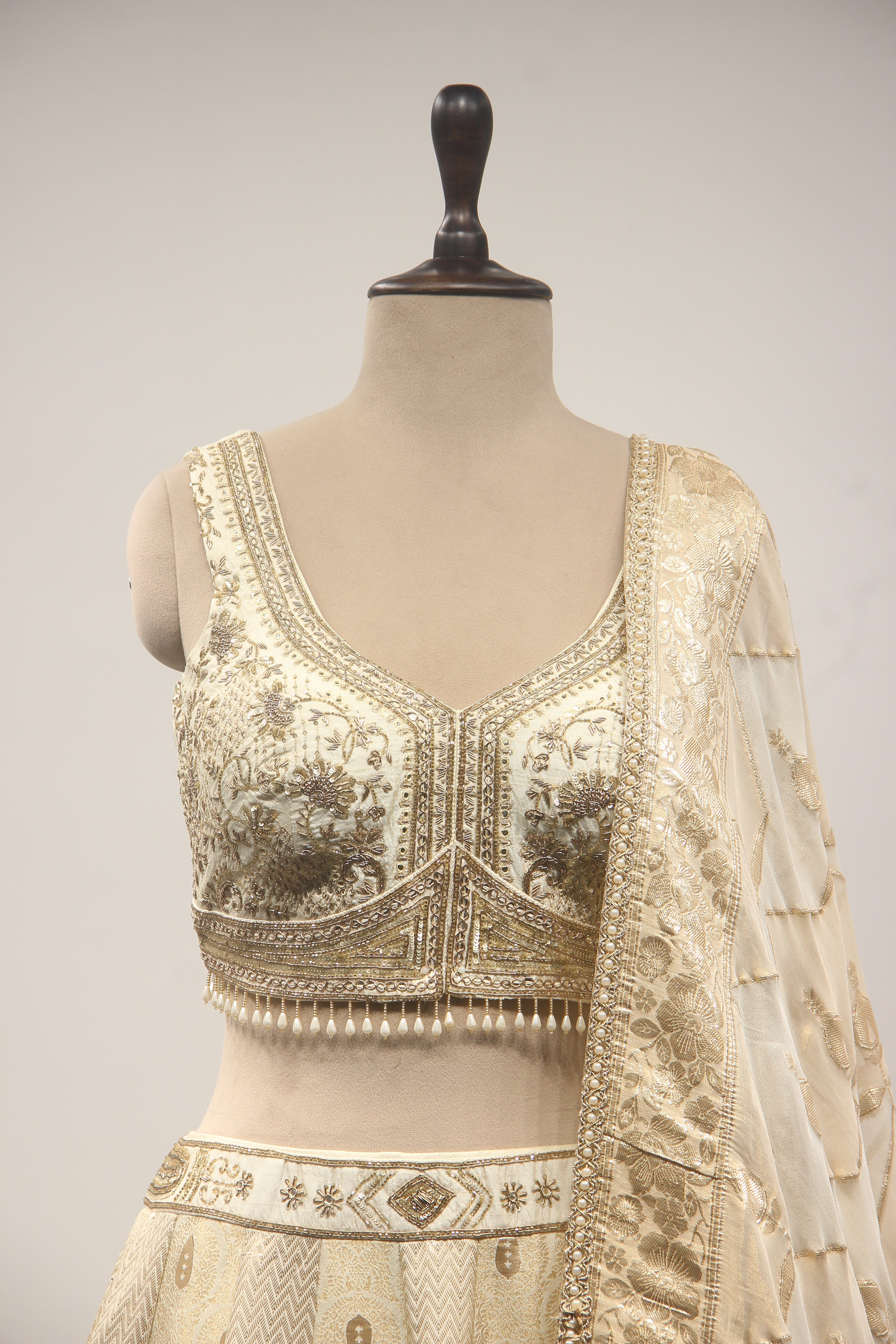 Cream Banarasi Brocade Lehenga with Hand Embroidery & Zardozi Handwork