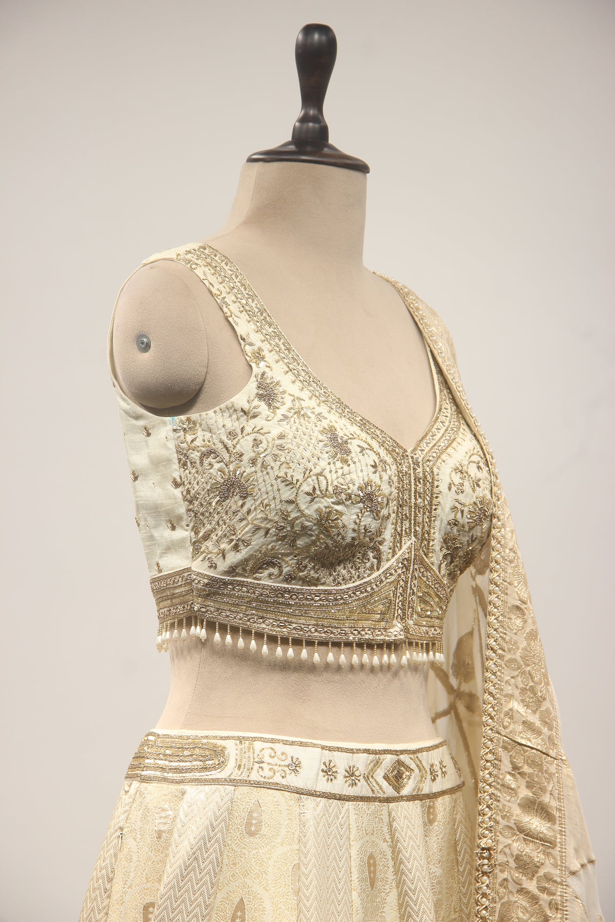 Cream Banarasi Brocade Lehenga with Hand Embroidery & Zardozi Handwork