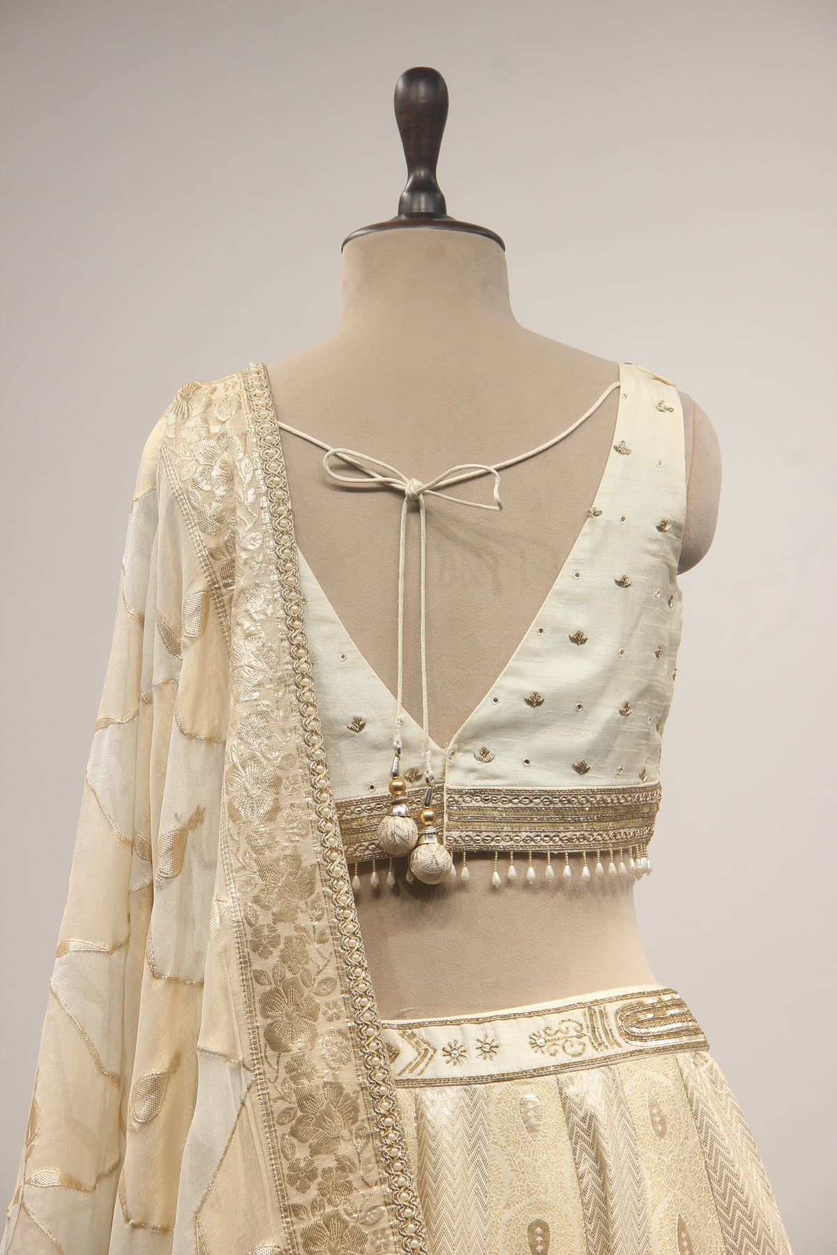 Cream Banarasi Brocade Lehenga with Hand Embroidery & Zardozi Handwork