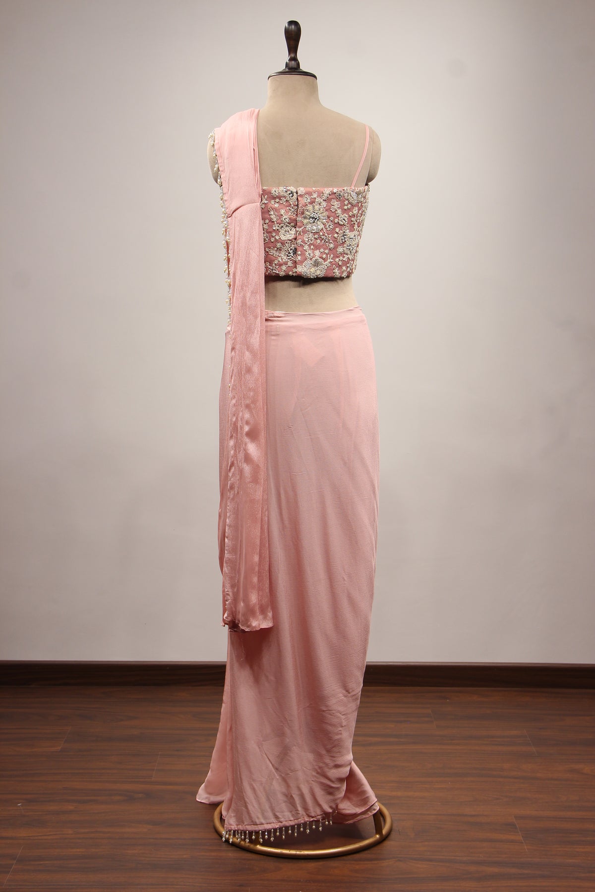 Baby Pink Crepe Drape Saree with Hand Embroidery & Resham Net Corset – back view