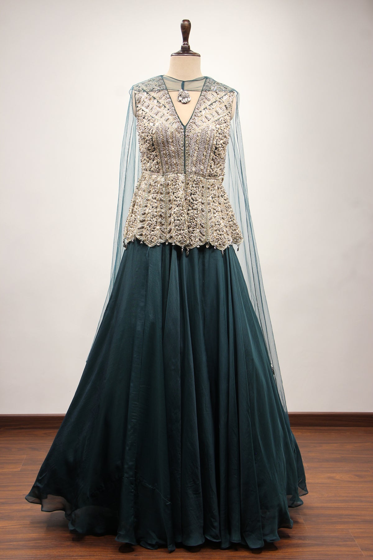 Bottle Green Organza Peplum Lehenga with Zari & Cut Dana Handwork – front view