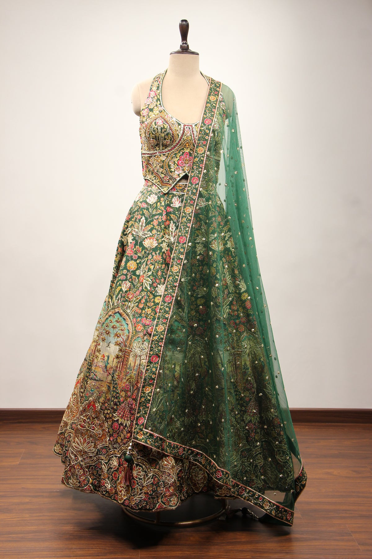 Bottle Green Dupion Halter Lehenga with Printed & Gota Patti Handwork – front view
