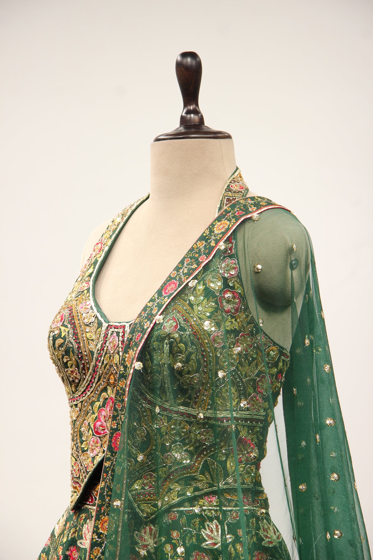 Bottle Green Dupion Halter Lehenga with Printed & Gota Patti Handwork – side close-up