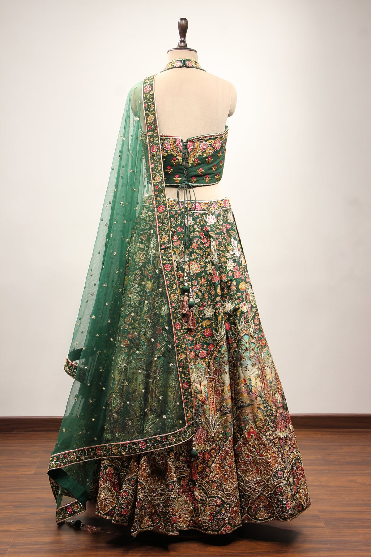 Bottle Green Dupion Halter Lehenga with Printed & Gota Patti Handwork – back view