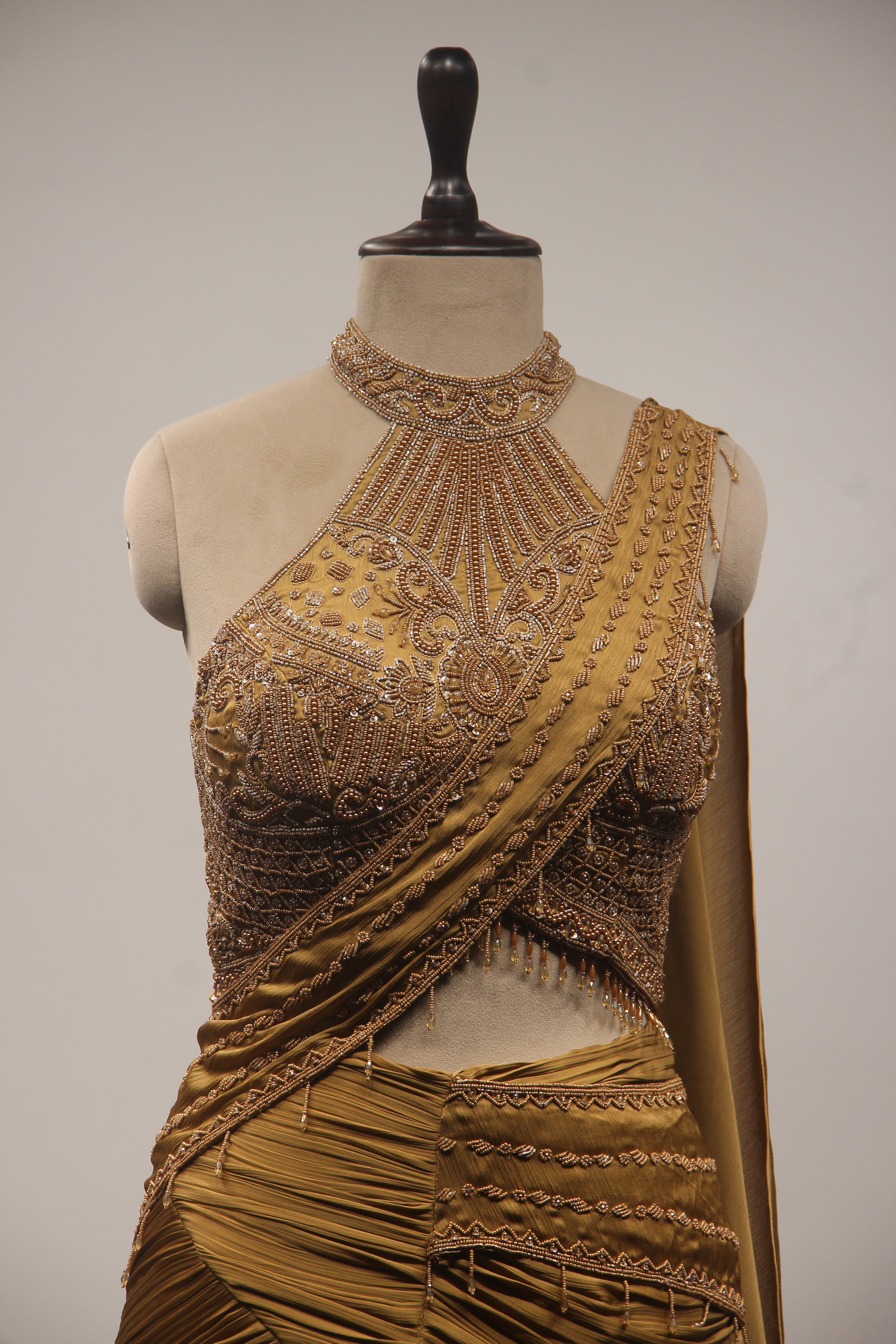 Gold Crepe Mermaid Lehenga with Bead & Cut Dana Handwork Drape Skirt
