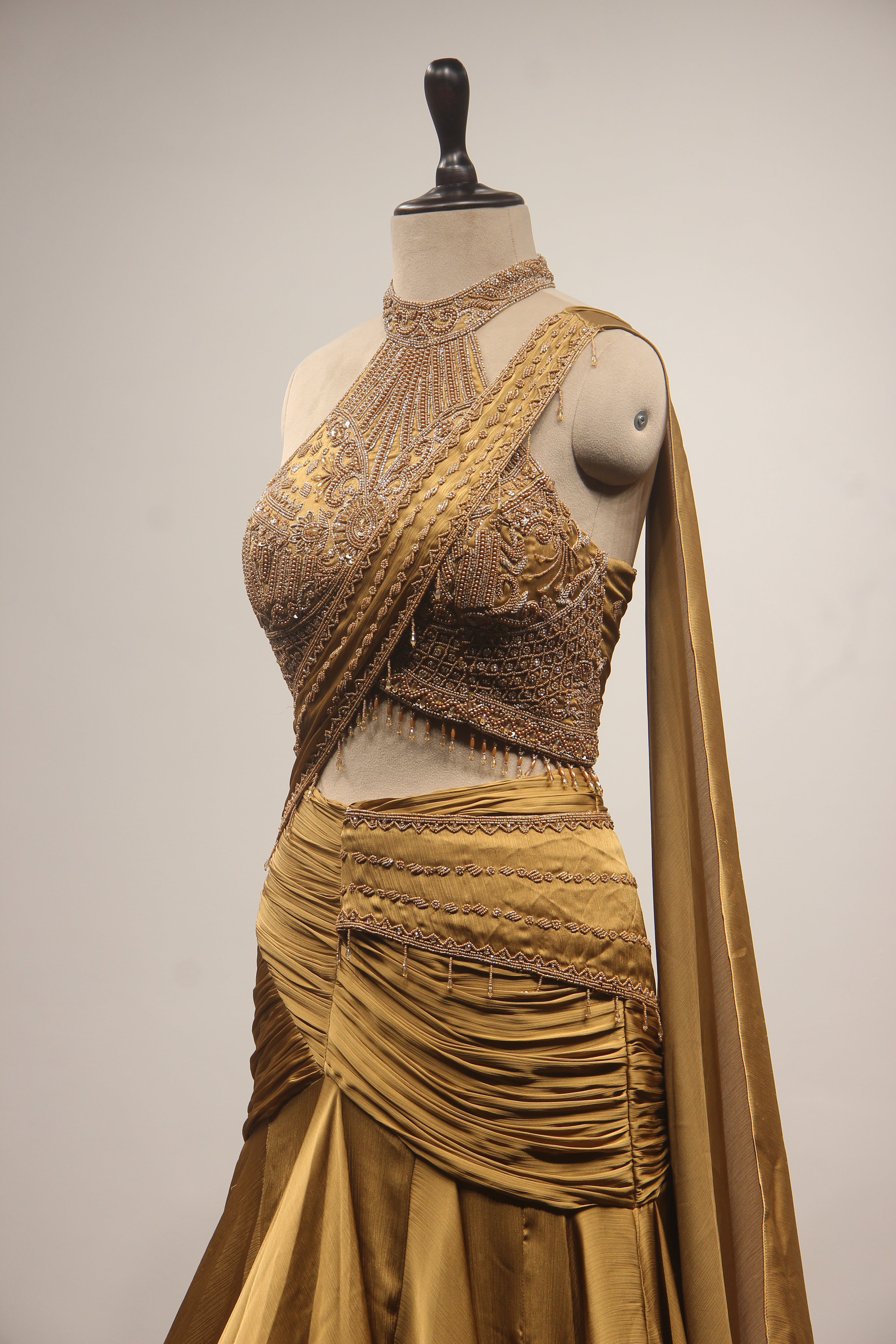 Gold Crepe Mermaid Lehenga with Bead & Cut Dana Handwork Drape Skirt