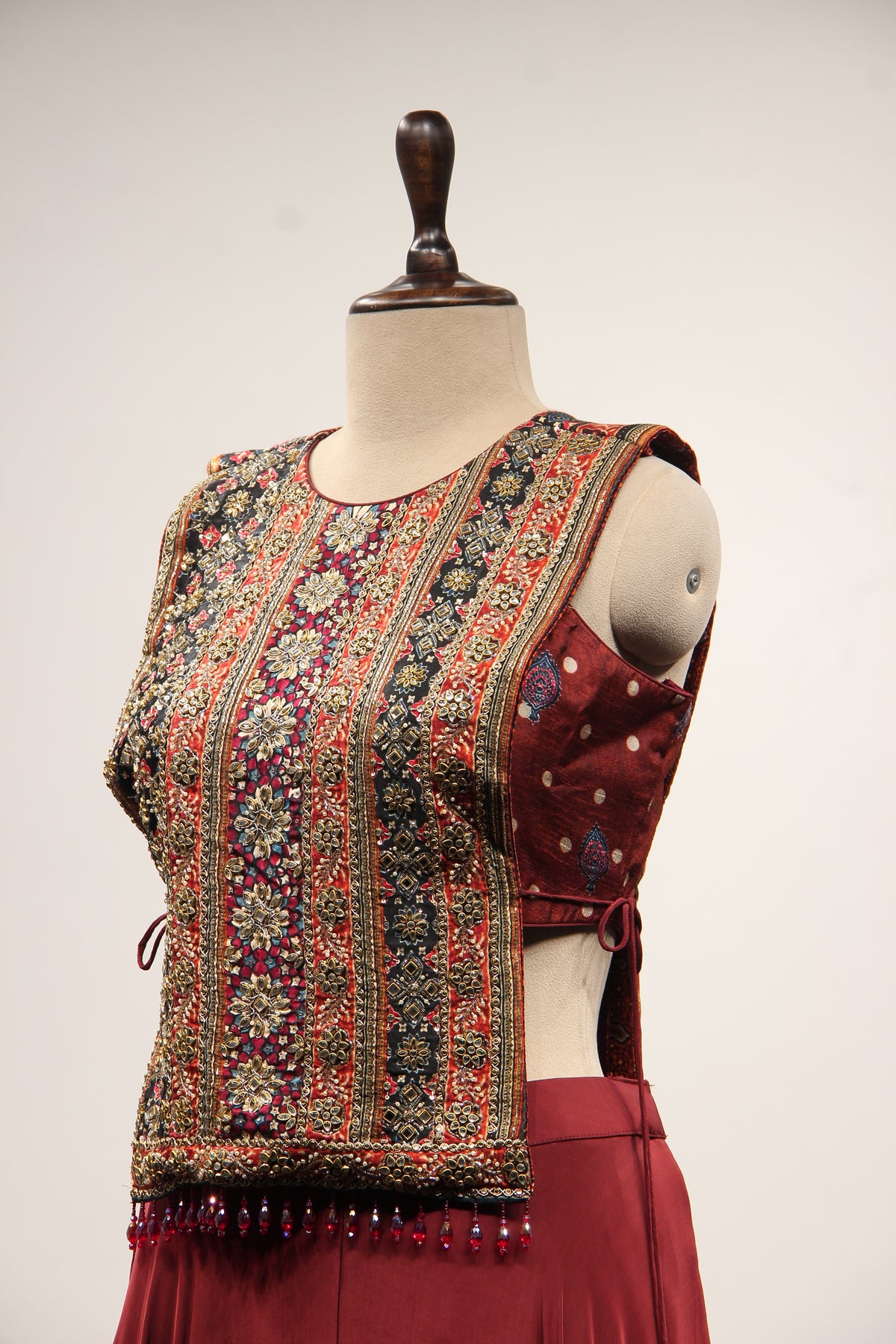 Maroon Crepe Indo Western Poncho Palazzo with Mirror & Zari Handwork – side close-up