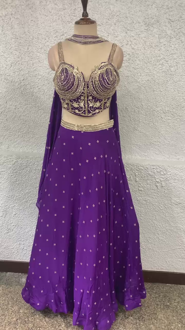 embroidery crepe lehenga with handwork corset blouse-video